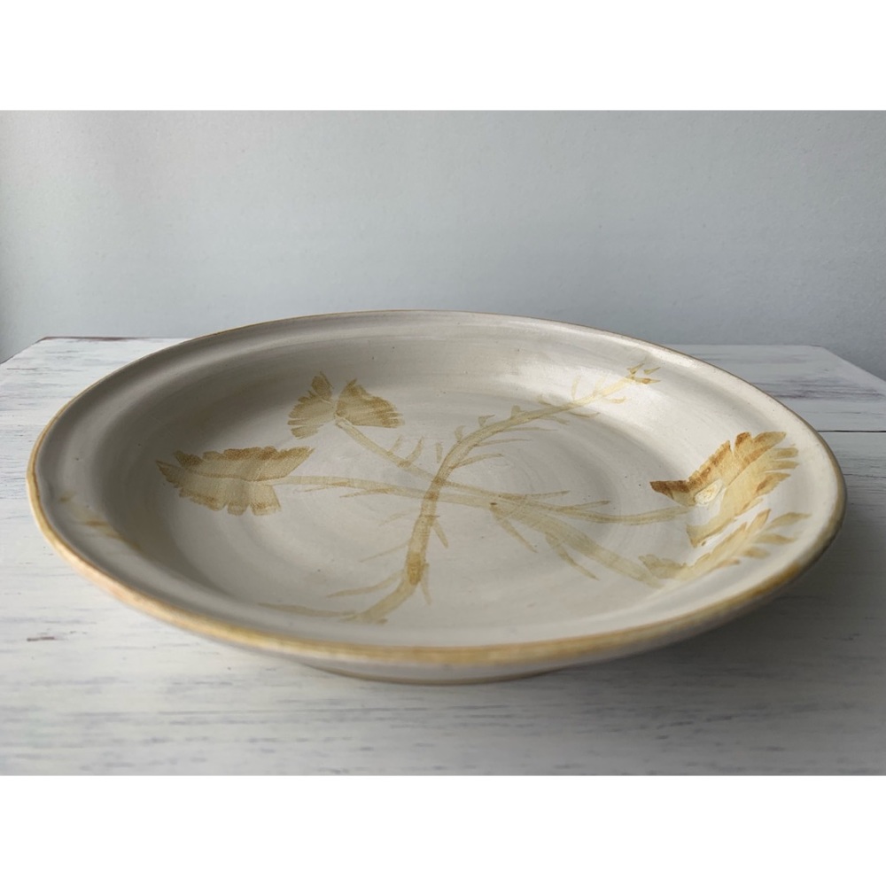 Vintage handmade pottery deep dish plate